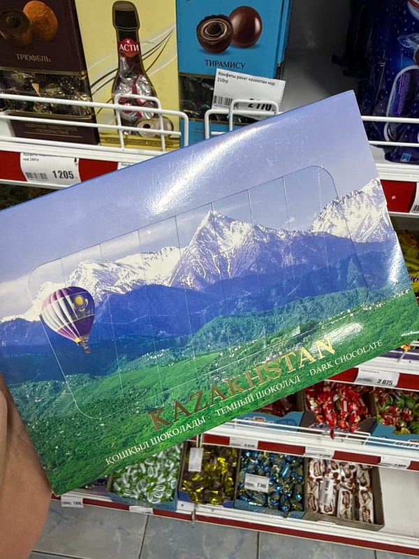 Shopper browses local chocolate and string cheese in Aksay store