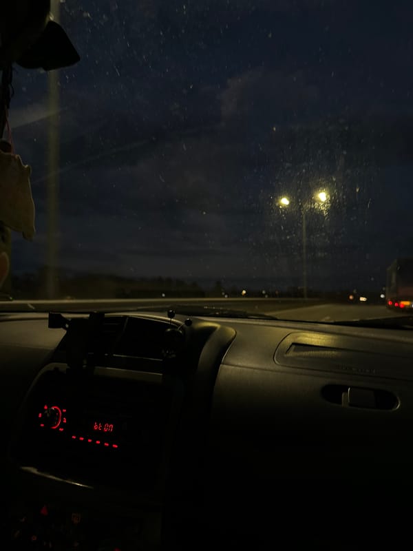 Nighttime dashboard view captured from inside car in Sofia