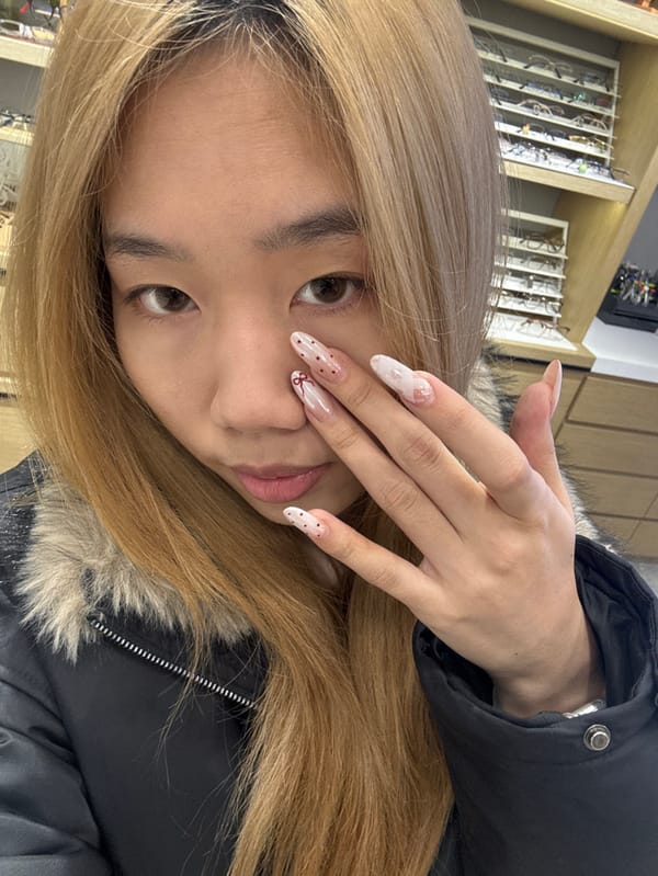 Woman documents eyeglasses store visit with selfies in Chongqing
