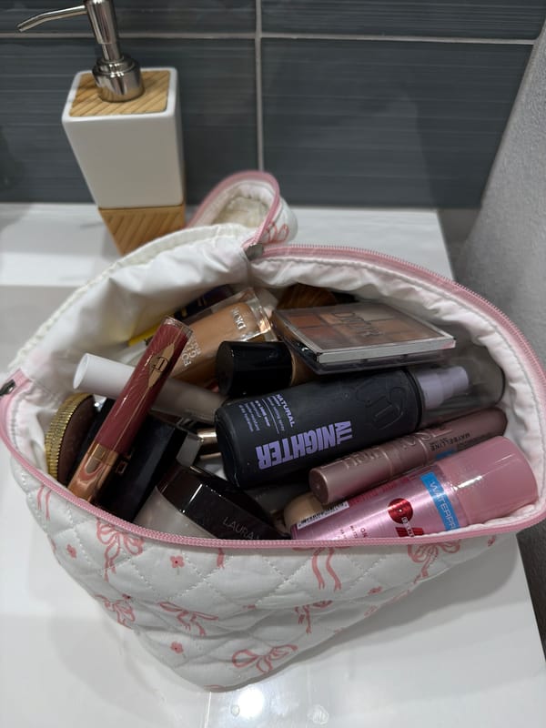 Woman photographs scenic view from stone patio in La Quinta