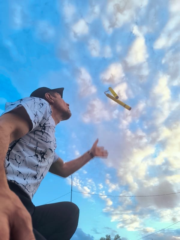 Nunchuck tricks and card games at golden hour in Karaganda