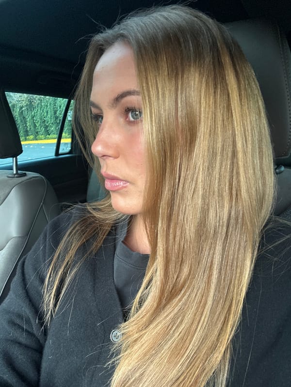 Blonde woman photographed in car in Mexico City suburb