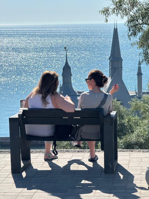 Beach crowds, waterfront views, and a pirate mannequin