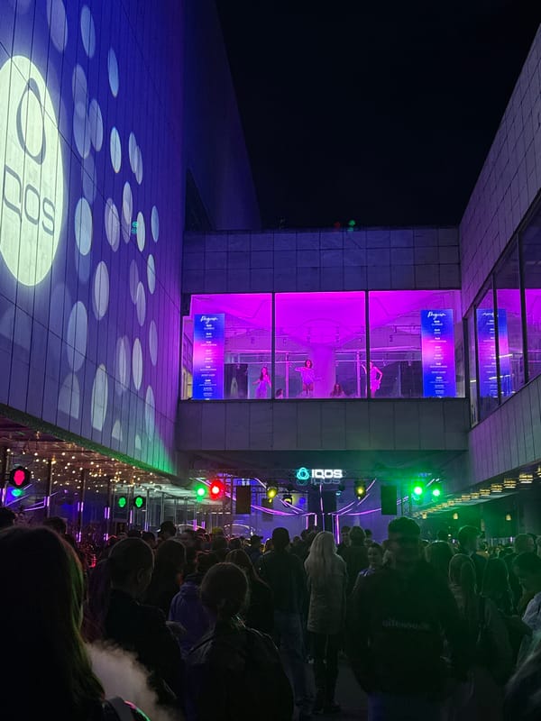 Crowd watches illuminated dance performance in Bratislava square