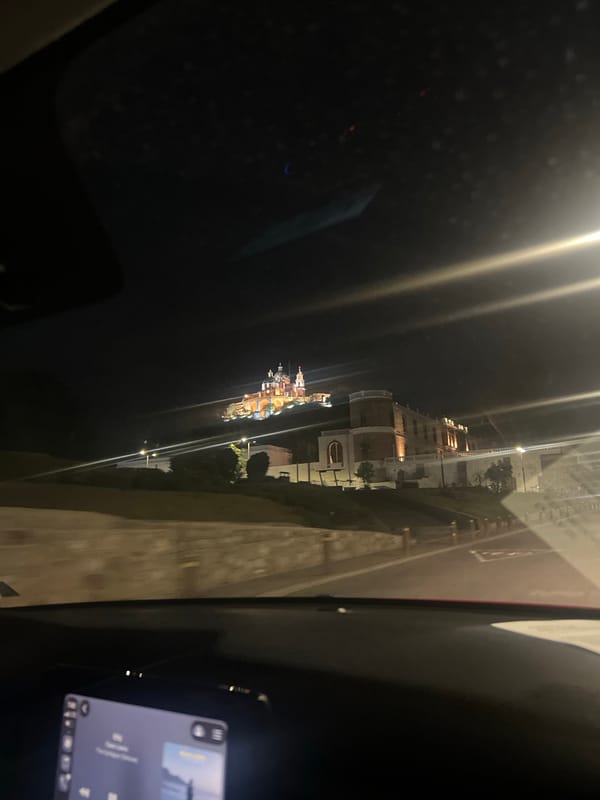 Nighttime drive through San Andrés Cholula captures lit streets