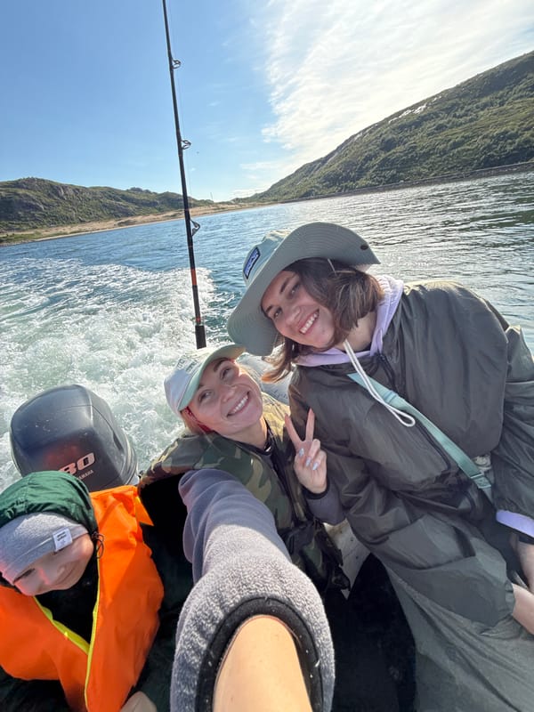 Boat trip through Teriberka's bay on a clear summer day