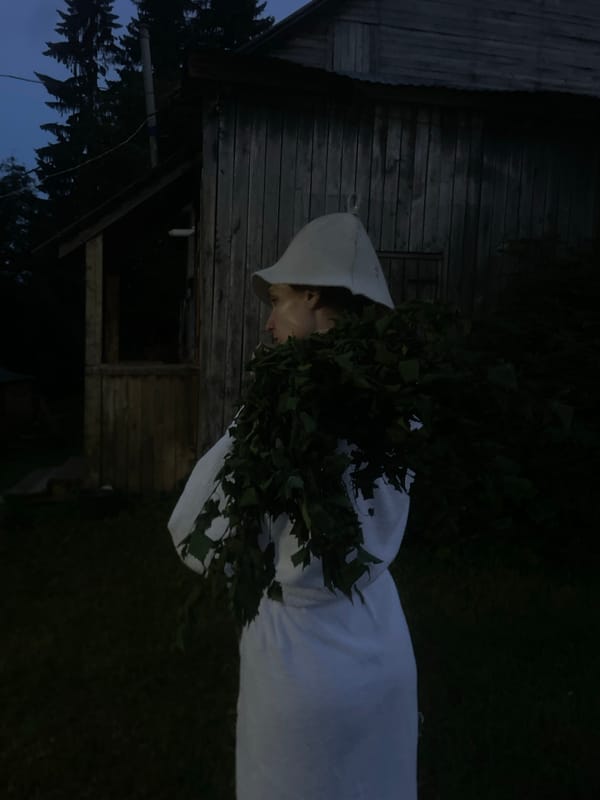 Traditional Russian banya experience with birch branches in Sharkan