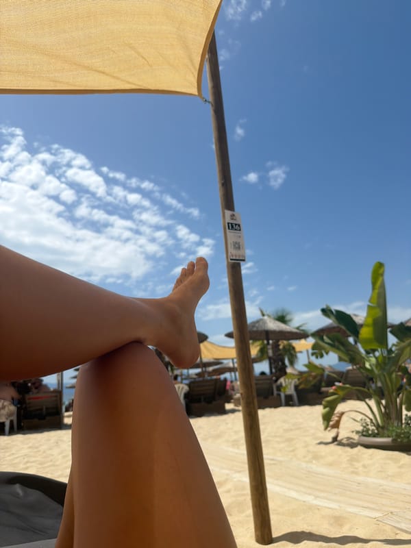 Kicking back on a lounger at Ofrynio Beach, Greece