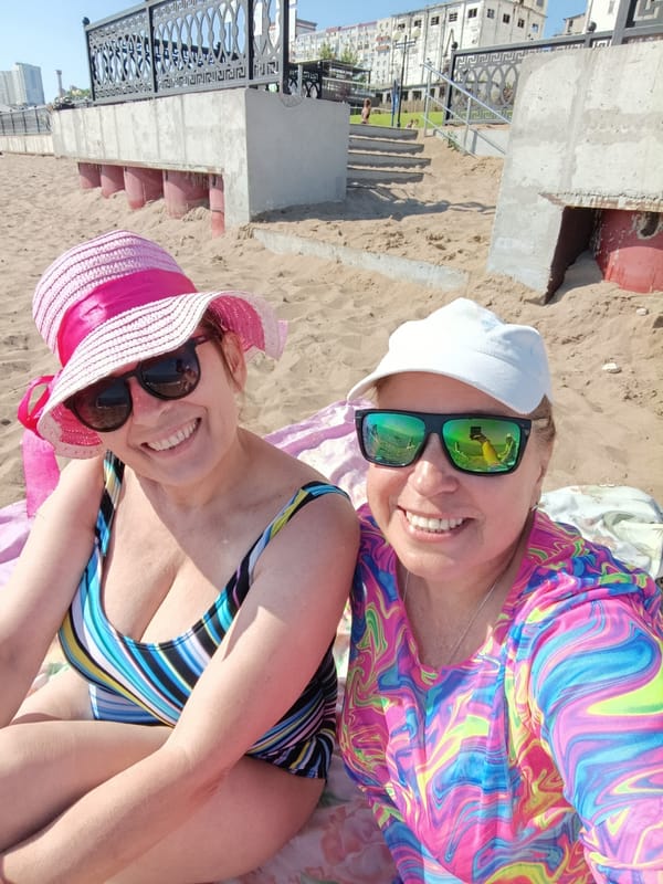 Sunny beach day with selfies and seaside strolls