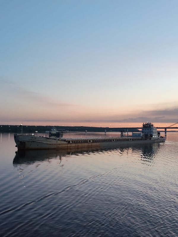 Cargo barge VOLGO-DON 161 observed at sunset near Cherepovets Bridge