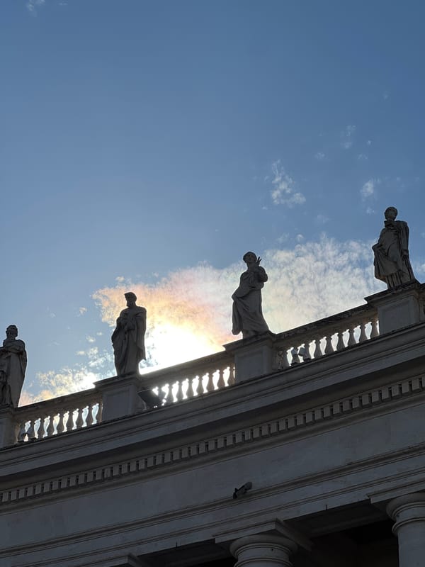 Tourists document sunny afternoon at St. Peter's Square, Vatican