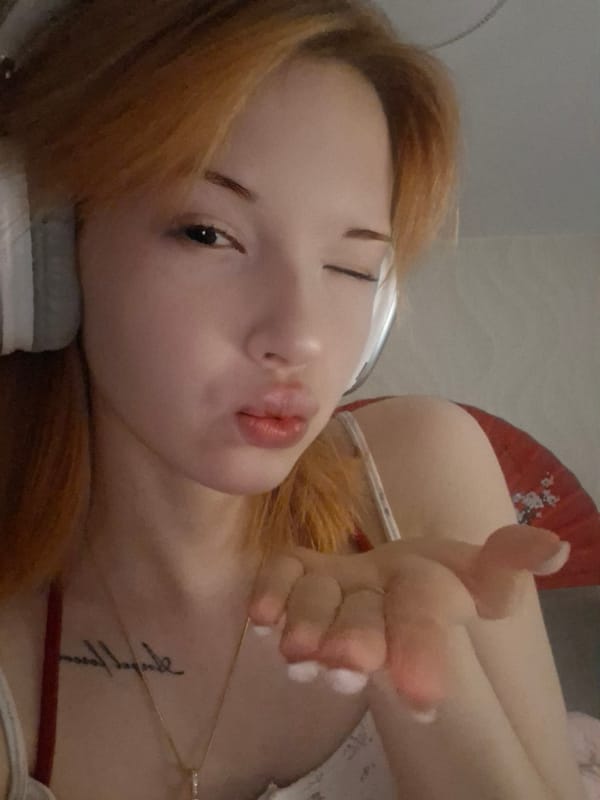 Woman poses for selfies during early morning in Chaikovsky