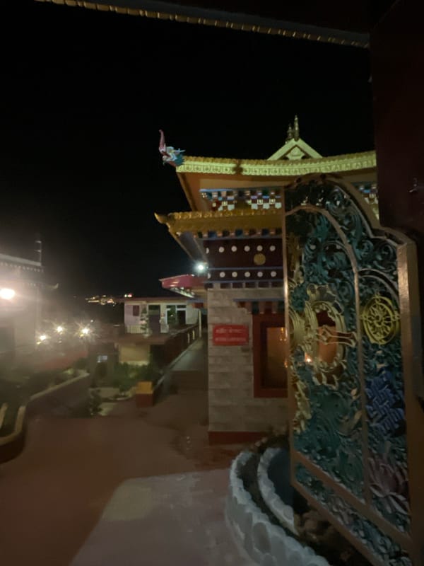 Ornate building with golden accents photographed in Dharamshala