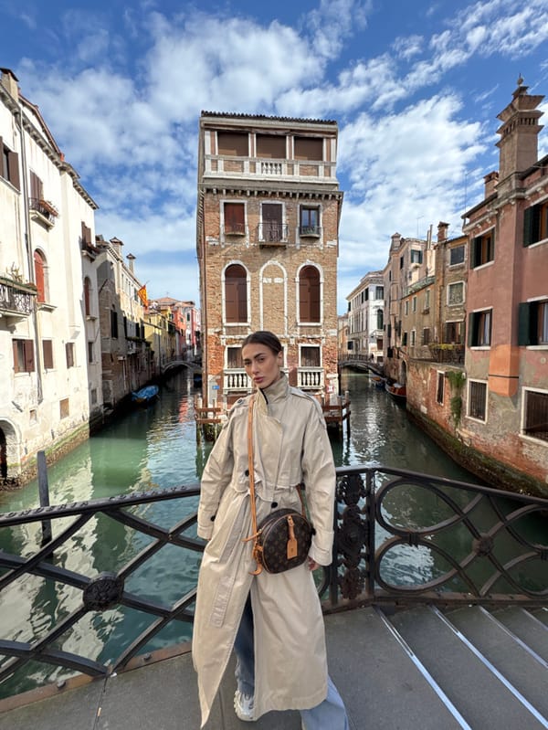 Tourist visits Venice bookstore and canals during midday