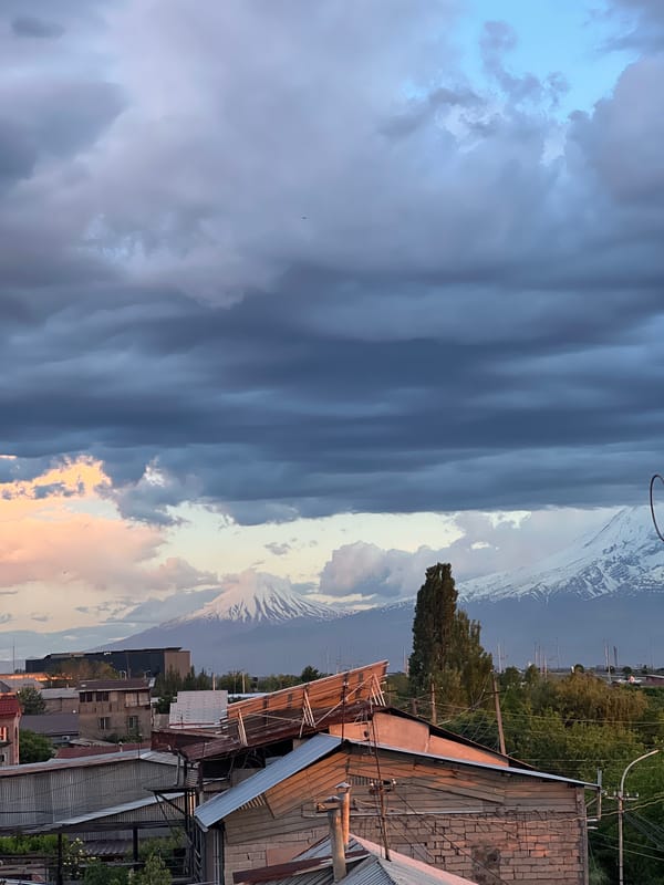 Dramatic sunset illuminates stormy skies over Yerevan, Armenia
