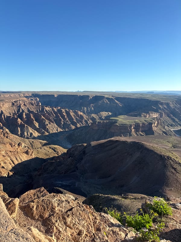 Visitors document Fish River Canyon views near Hobas, Namibia