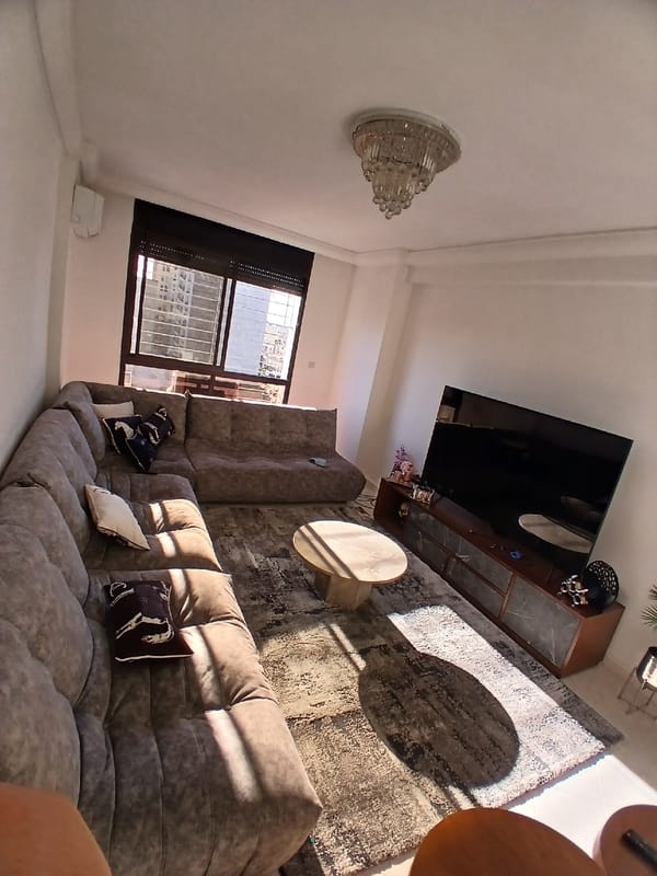 Living room with horse-themed decor and wrapped artwork documented