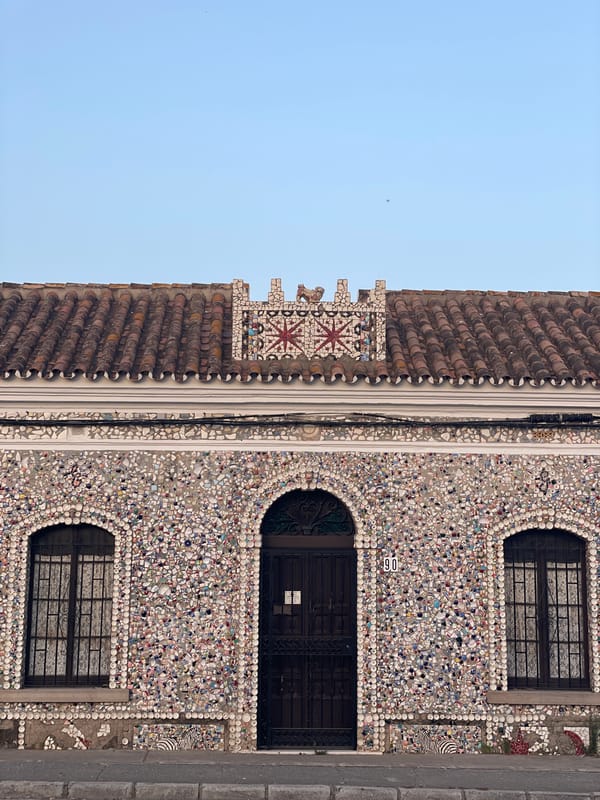 Street-level details from La Línea de la Concepción on a summer evening