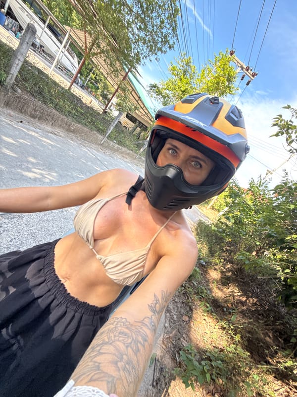 Scooter ride through Ko Samui's tree-lined roads