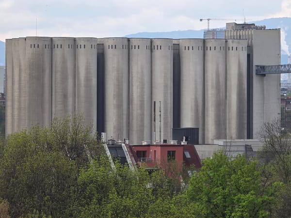Industrial complex with silos and striped chimneys observed in Sofia