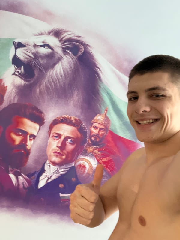 Person displays Bulgarian artwork at Varna cafe