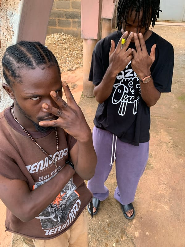 Afternoon street life in Jos Nigeria neighborhood