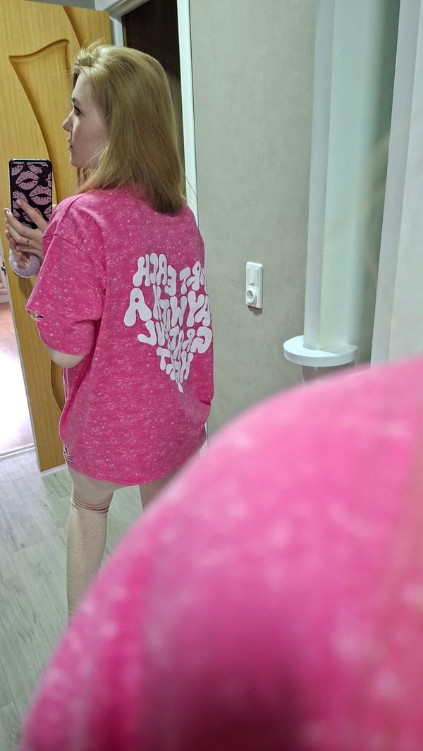 Woman takes selfies with decorated phone in Chaikovsky