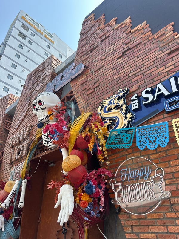 Street scene documented in Nha Trang featuring white building