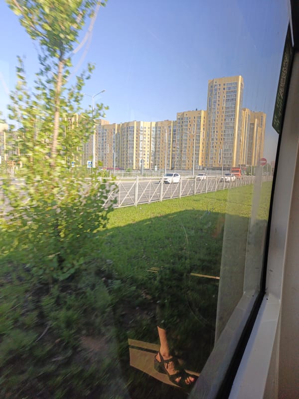 Street-level Kazan: transit views and a covered walkway