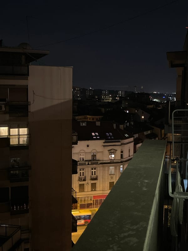 Nighttime Belgrade rooftop views captured in Vracar district