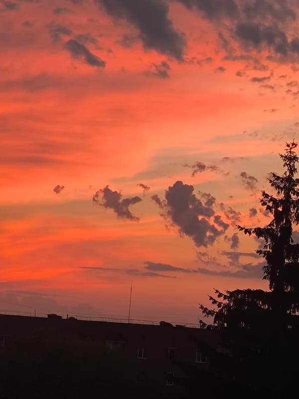 Fiery sunset lights up the sky over Pryluky, Ukraine