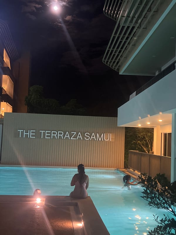 Late-night pool hangout at a Samui resort, with room details