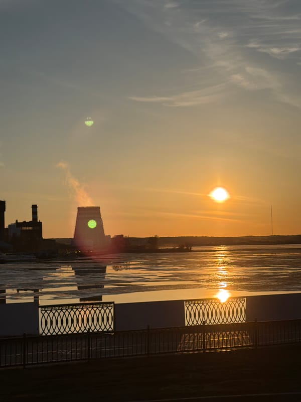 Evening walk through Izhevsk captures sunset, cathedral, restaurants