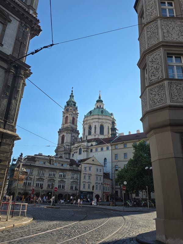 Prague church and white peacock captured in European settings