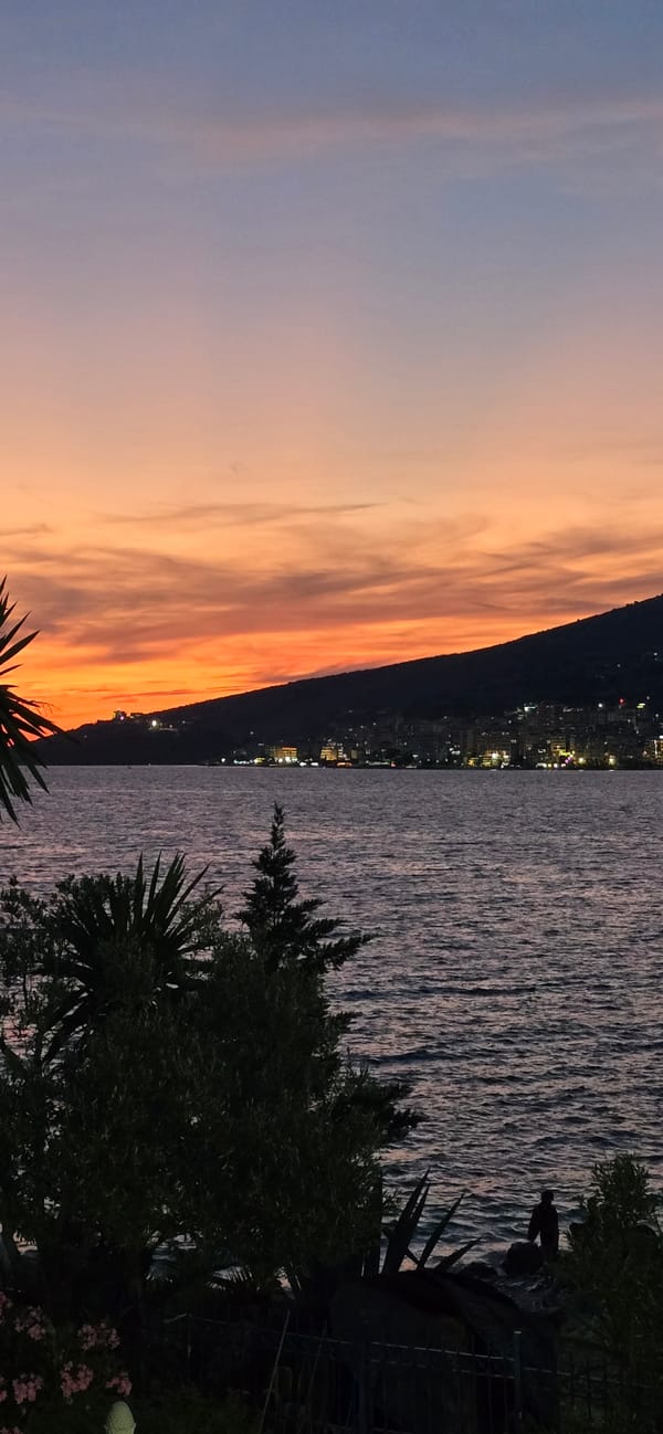 Saranda sunset from rooftops and waterfront, Ionian Sea