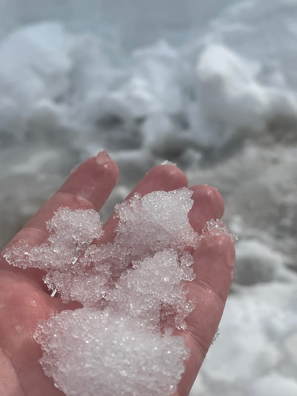 Hand holds melting ice in Pavlovka, Russia