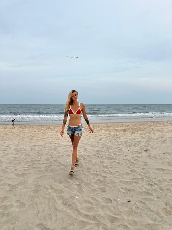 Two women enjoy morning beach time in Vietnam