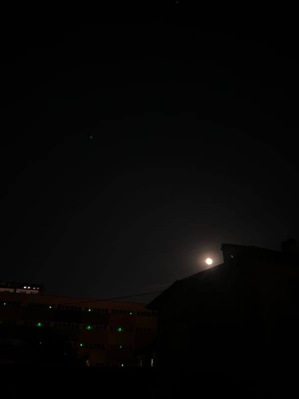 Nighttime documentation of Sofia cityscape and Mercedes vehicle