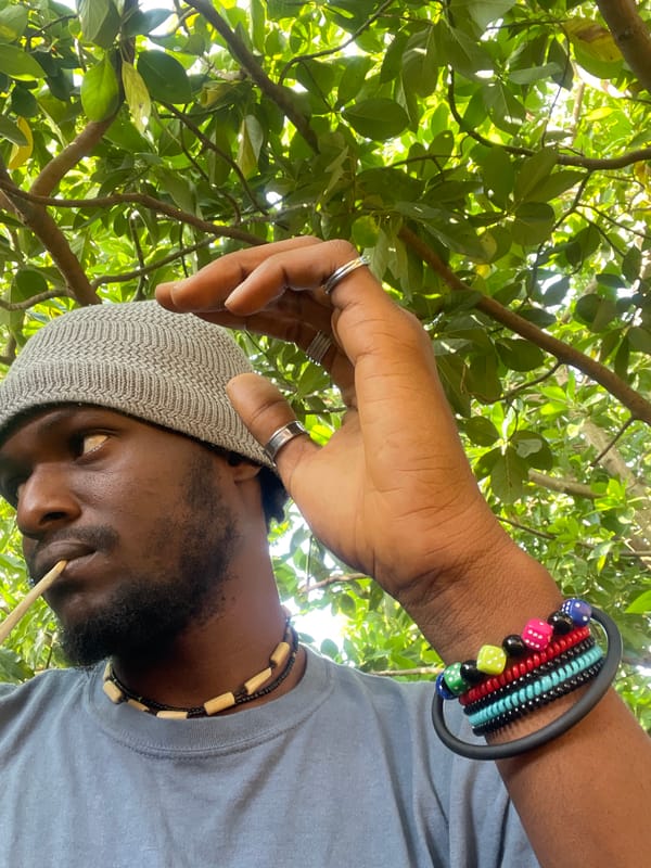 Man observed looking up at tree in Jos, Nigeria