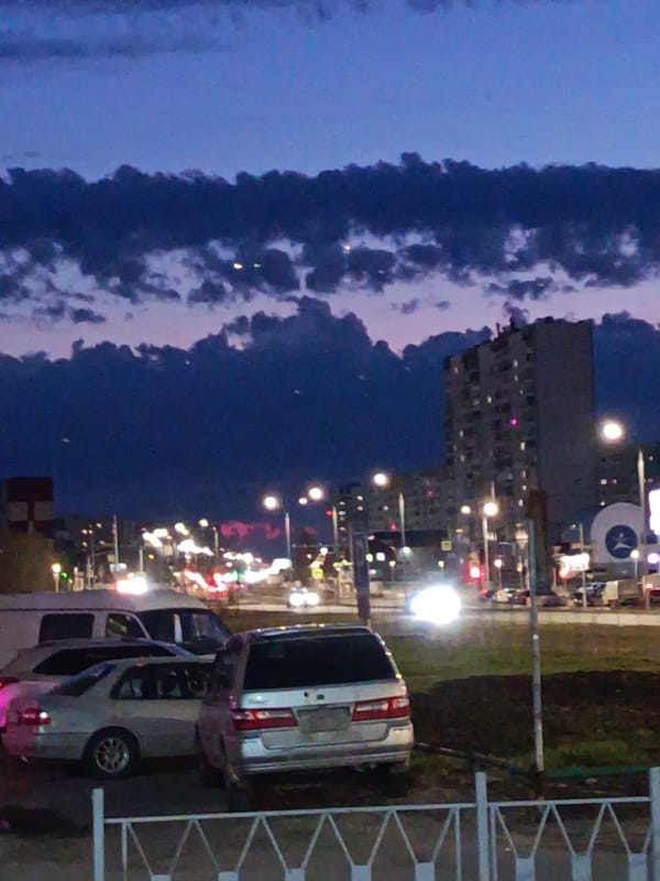 Twilight sky with crescent moon observed over Nizhnevartovsk