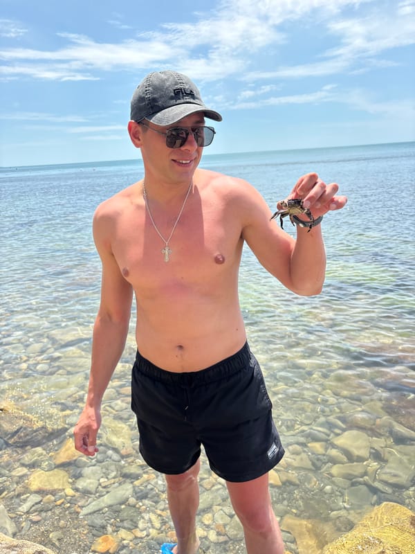 Catching crabs and hanging out on Anapa's rocky Black Sea shore