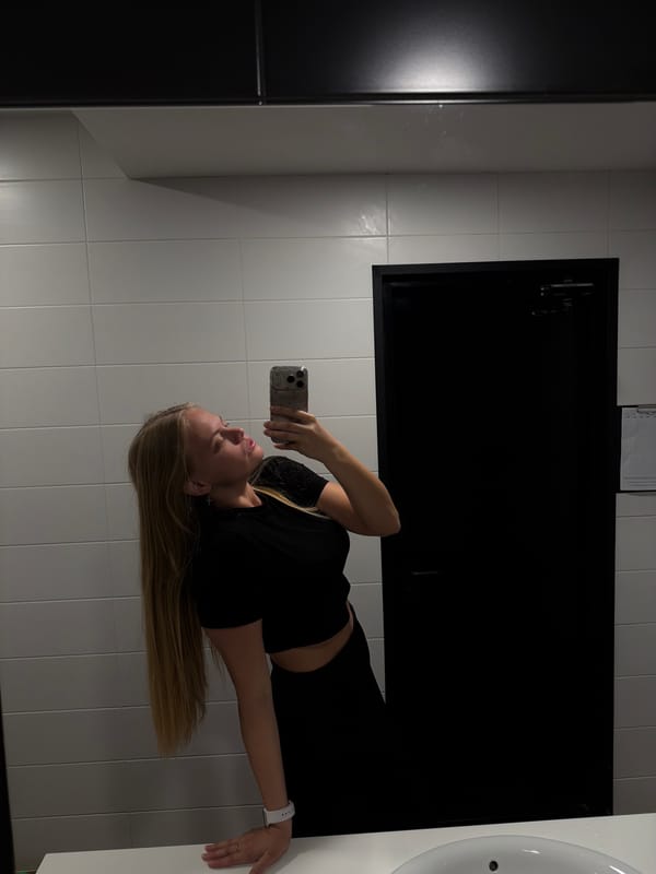 Woman takes mirror selfies in Izhevsk bathroom early morning