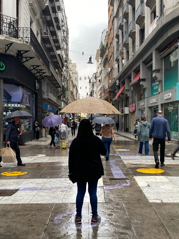 Rainy evening brings umbrellas to Buenos Aires streets