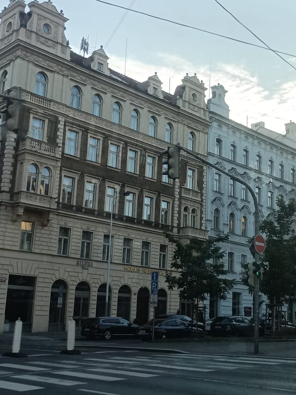 Rolling through Prague's historic streets by vehicle