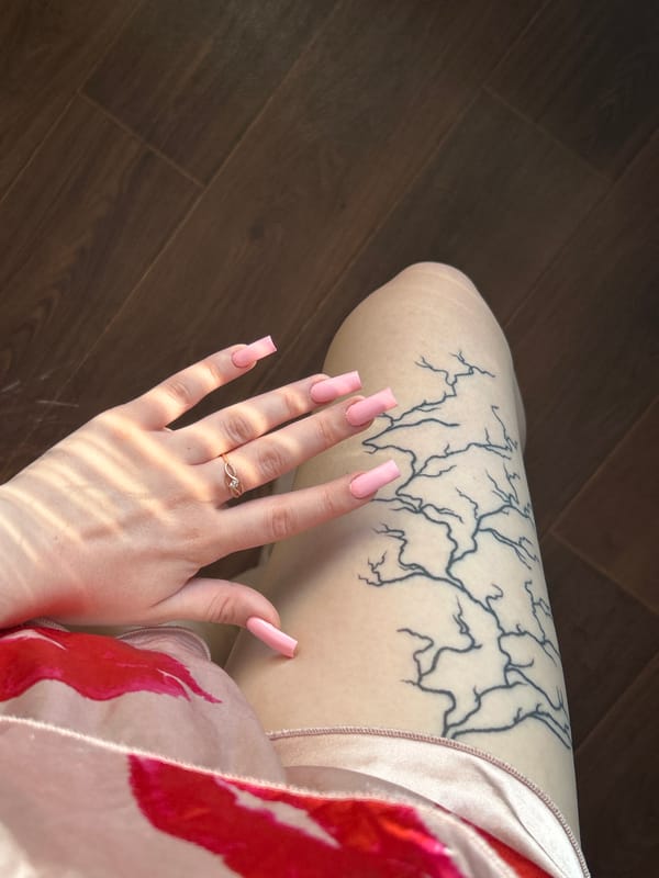 Pink satin and close-up selfies in a morning indoor shoot