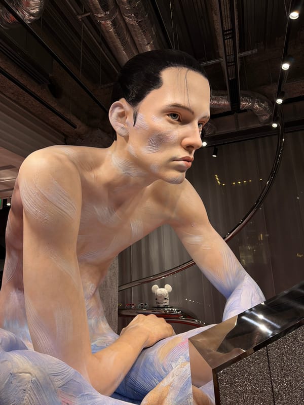Visitors document hyperrealistic mannequin display in Chuo, Japan