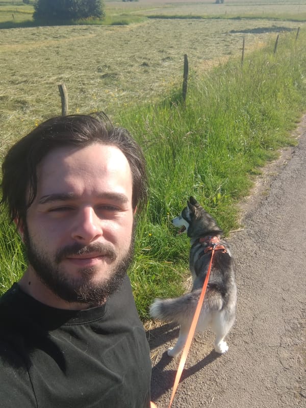 Man takes selfie with husky in Luxembourg countryside