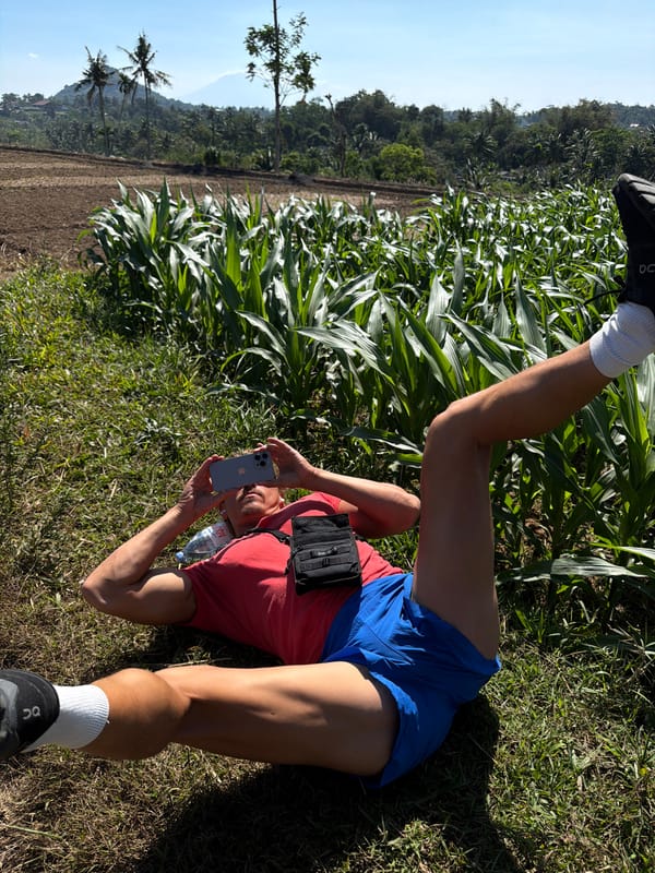 Resting by a cornfield in rural Dampit, Indonesia