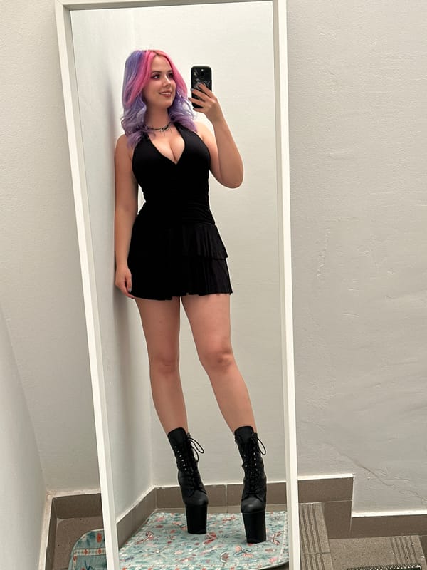 Pink-haired woman documents afternoon with selfies in Zagreb