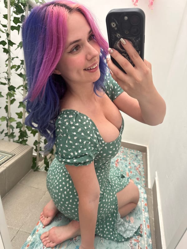 Woman documents colorful hair transformation with selfie session in Zagreb